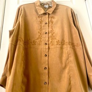 97% polyester 3% spandex beautiful tan piece with vine embroidery. Super Soft